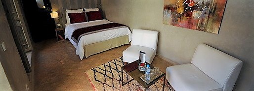 Asni room of the riad with its Moroccan headboard, riad available tonight in Marrakech